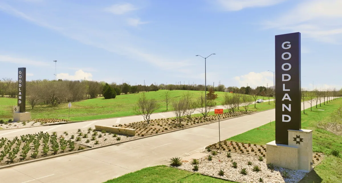 Goodland Texas MUD district entrance with lush greenery and modern infrastructure, representing MUD financing solutions an...